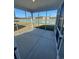 Relaxing screened porch overlooking a tranquil lake at 293 Hawks Run Dr., Calabash, NC 28467