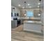 Modern kitchen with granite countertops and island at 293 Hawks Run Dr., Calabash, NC 28467
