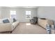 Relaxing loft sitting area with comfy couch and recliner at 3519 Cornflower Way, Conway, SC 29526