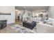 Bright living room features a spacious sectional sofa and an open floor plan at 3519 Cornflower Way, Conway, SC 29526