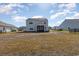 Large backyard with a screened porch, providing ample outdoor space at 3519 Cornflower Way, Conway, SC 29526