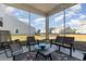 Screened porch with seating area and backyard views at 3519 Cornflower Way, Conway, SC 29526