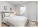 Cozy bedroom with a full-size bed and a window at 3519 Cornflower Way, Conway, SC 29526