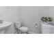 Clean and bright bathroom with pedestal sink and toilet at 3519 Cornflower Way, Conway, SC 29526