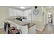 Kitchen with stainless steel appliances and a breakfast bar at 912-B S Ocean Blvd., Surfside Beach, SC 29575