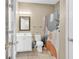 Clean bathroom with shower/tub combo and updated vanity at 912-B S Ocean Blvd., Surfside Beach, SC 29575