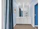 Double vanity with a large mirror, creating an elegant atmosphere at 912-B S Ocean Blvd., Surfside Beach, SC 29575