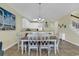 Dining area with kitchen and hallway views, and adjacent to the kitchen at 912-B S Ocean Blvd., Surfside Beach, SC 29575