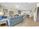 Living room with blue sofas and TV at 912-B S Ocean Blvd., Surfside Beach, SC 29575