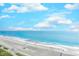 Expansive beach with ocean waves and clear blue sky at 1501 S Ocean Blvd. # 1038, Myrtle Beach, SC 29577