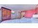 Bedroom with two beds, a wood wardrobe, and ocean view at 1501 S Ocean Blvd. # 1038, Myrtle Beach, SC 29577