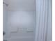 Clean white shower stall with a white shower curtain at 1501 S Ocean Blvd. # 1038, Myrtle Beach, SC 29577