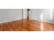Well-lit bedroom featuring hardwood floors and two entrances at 432 N Smith Rd., Mullins, SC 29574