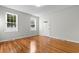 Spacious living room with hardwood floors and large windows at 432 N Smith Rd., Mullins, SC 29574