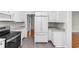Modern kitchen with white cabinets, stainless steel appliances, and granite countertops at 432 N Smith Rd., Mullins, SC 29574