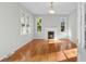 Spacious living room with hardwood floors and fireplace at 432 N Smith Rd., Mullins, SC 29574