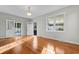Bright living room with hardwood floors and French doors at 432 N Smith Rd., Mullins, SC 29574