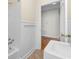 Updated bathroom with a pedestal sink and access to another room at 432 N Smith Rd., Mullins, SC 29574