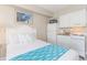 Bedroom with a single bed and a kitchenette at 1207 S Ocean Blvd. # 20703, Myrtle Beach, SC 29577