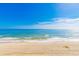 Wide sandy beach with ocean waves at 1207 S Ocean Blvd. # 20703, Myrtle Beach, SC 29577