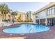 Outdoor pool with surrounding lounge chairs at 1207 S Ocean Blvd. # 20703, Myrtle Beach, SC 29577
