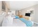 Two twin beds in a condo bedroom with ocean view access at 1207 S Ocean Blvd. # 20703, Myrtle Beach, SC 29577