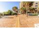Brick walkway lined with palm trees leading to the beach at 1207 S Ocean Blvd. # 20703, Myrtle Beach, SC 29577