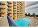 Resort-style pool with plenty of lounge chairs at 1207 S Ocean Blvd. # 20703, Myrtle Beach, SC 29577