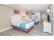 Two twin beds with white linens and teal accents in a condo bedroom at 1207 S Ocean Blvd. # 20703, Myrtle Beach, SC 29577