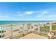 Deck overlooking the beach with ocean view at 551 S Waccamaw Dr., Garden City Beach, SC 29576
