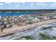 Beachfront community view from above; showcasing homes and ocean access at 551 S Waccamaw Dr., Garden City Beach, SC 29576