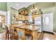 Well-equipped kitchen featuring granite countertops and ample cabinetry at 551 S Waccamaw Dr., Garden City Beach, SC 29576