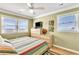 Ocean view bedroom with striped bedspread and dresser at 551 S Waccamaw Dr., Garden City Beach, SC 29576