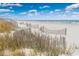 Beachfront view with wooden fence at 2301 N Ocean Blvd. # 531, Myrtle Beach, SC 29577