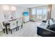 Living room with ocean view and dining area at 2301 N Ocean Blvd. # 531, Myrtle Beach, SC 29577