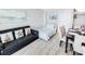 Living room with pull-out sofa bed and dining area at 2301 N Ocean Blvd. # 531, Myrtle Beach, SC 29577