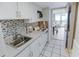 Well-equipped galley kitchen with modern appliances at 2301 N Ocean Blvd. # 531, Myrtle Beach, SC 29577