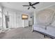 Bright bedroom with carpet, double doors, and a dresser at 2000 Musgrove Mill Way, Myrtle Beach, SC 29579