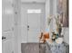 Welcoming entryway with a bench and stylish decor at 2000 Musgrove Mill Way, Myrtle Beach, SC 29579