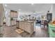 Open kitchen with an island, stainless steel appliances, and granite countertops at 2000 Musgrove Mill Way, Myrtle Beach, SC 29579