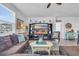 Cozy living room features a comfortable couch and a large TV at 2000 Musgrove Mill Way, Myrtle Beach, SC 29579