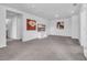 Spacious bonus room with carpet, TV, and plenty of natural light at 2000 Musgrove Mill Way, Myrtle Beach, SC 29579