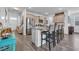 Open concept kitchen with island and breakfast bar at 2000 Musgrove Mill Way, Myrtle Beach, SC 29579