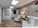 Building lobby with seating area and artwork at 5001 Little River Rd. # E115, Myrtle Beach, SC 29577