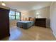 Bedroom with a double bed and large window at 5001 Little River Rd. # E115, Myrtle Beach, SC 29577