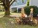 Autumnal scarecrows decorating the building exterior at 5001 Little River Rd. # E115, Myrtle Beach, SC 29577