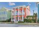Two-story coral house with front porch and American flag at 1426 Peterson St., Myrtle Beach, SC 29577