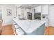 Modern kitchen featuring a large island with seating and marble countertops at 1426 Peterson St., Myrtle Beach, SC 29577