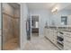 Bathroom with large shower, double vanity, and access to bedroom at 4402 Boxwood St., Myrtle Beach, SC 29577