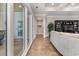Bright hallway with hardwood floors and access to backyard at 4402 Boxwood St., Myrtle Beach, SC 29577